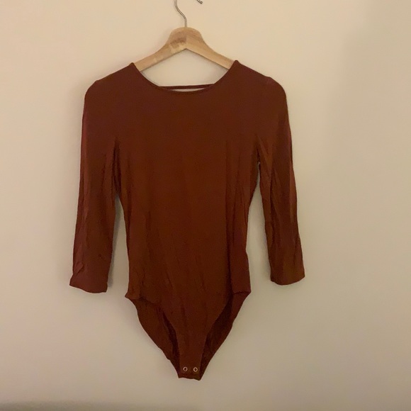 Burnt orange body suit. - Picture 1 of 2